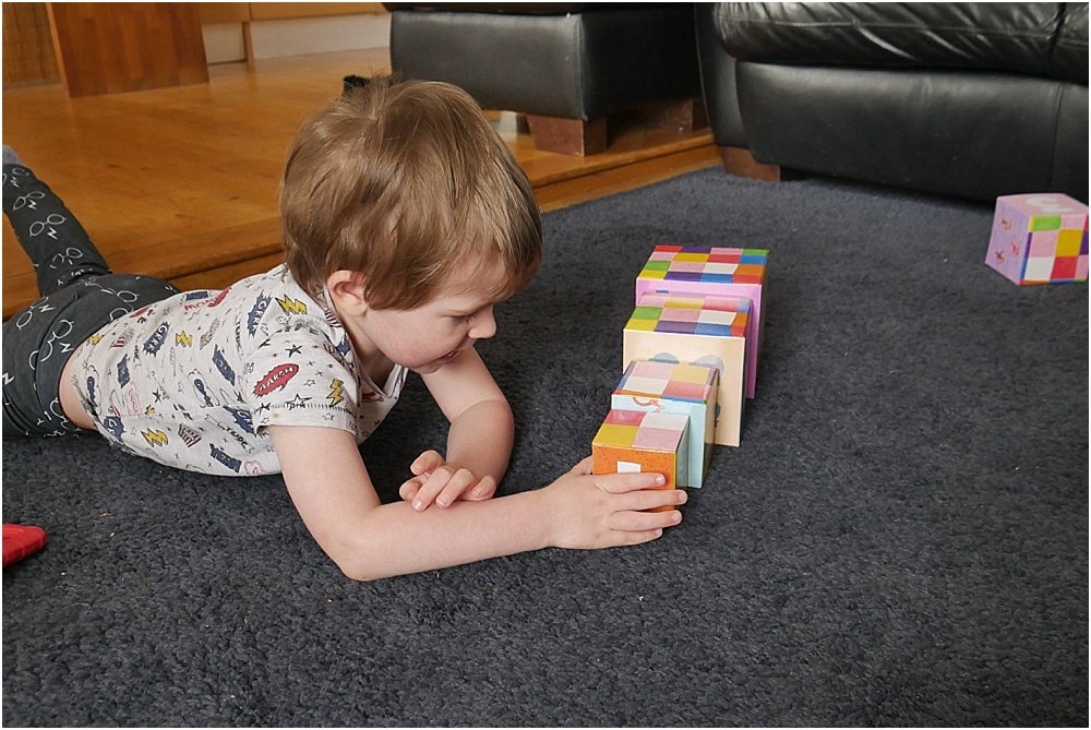 Milly and Flynn Elmer the elephant stacking blocks