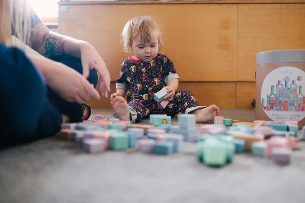Games for toddlers to play with wooden building blocks