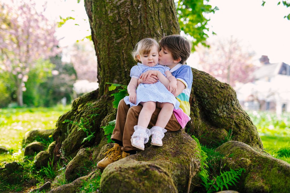 sibling Portrait in the blossoms